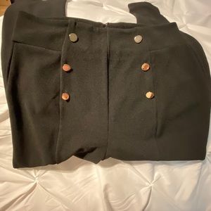 Black trousers with gold buttons